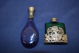 Two scent bottles.