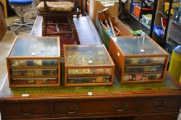 A large collection of buttons in purpose made storage drawers.