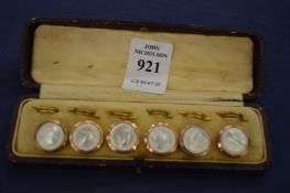 Cased set of six mother of pearl dress studs.