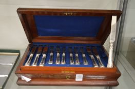 A cased set of eighteen silver handled dessert knives and forks.