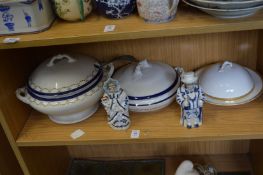 A pair of porcelain nodding head figures and other items.