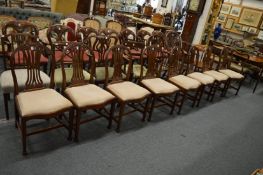 A set of eight mahogany dining chairs with drop-in seats.
