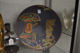 A Rosenthal pottery circular dish with hand painted abstract design, signed Portanier.