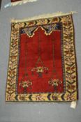 A modern Persian style prayer rug, 110cm x 85cm.