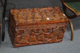 A Benin style carved small hardwood trunk.