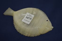 A carved pin tray modelled as a fish.