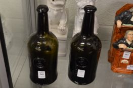 Two 19th century crested wine bottles.