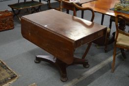 A 19th century mahogany pedestal Pembroke table.