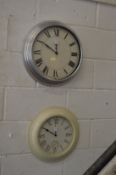 Two modern wall clocks.