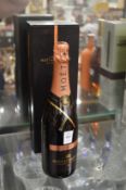 A bottle of Moet and Chandon vintage rose Champagne 2000, boxed.