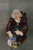 A Staffordshire toby jug The Watchman.