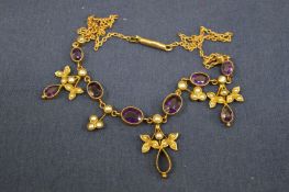 A 9ct gold amethyst and seed pearl necklace.