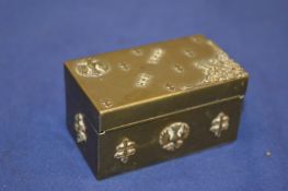 A small brass box.