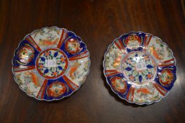 A pair of Imari plates.