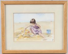 ENGLISH SCHOOL (20TH CENTURY) Girl on a beach building a sand castle, watercolour, signed with a
