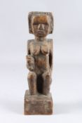 GERMAN EXPRESSIONIST SCHOOL carved wooden figure of a seated nude, height 32cm