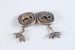 A PAIR OF RUSSIAN SILVER AND SAPPHIRE ELEPHANT CUFFLINKS.