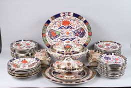 A COMPREHENSIVE CROWN DERBY IMARI DINNER SERVICE COMPRISING: a twin handled oval tureen and cover