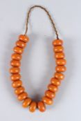 A LARGE BEAD NECKLACE, each bead 3.5cms.