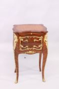 A FRENCH STYLE MAHOGANY, PARQUETRY AND ORMOLU PETIT COMMODE, with a brushing slide over two