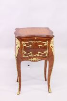 A FRENCH STYLE MAHOGANY, PARQUETRY AND ORMOLU PETIT COMMODE, with a brushing slide over two
