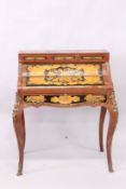 A FRENCH STYLE MAHOGANY, ORMOLU AND PEN WORK DECORATED ROLL-TOP DESK, on curving legs, 3ft 6in