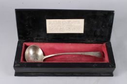 A SILVER OLD ENGLISH PATTERN LADLE, London 1811, maker TB, engraved to the end with the initial 'W',