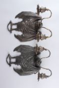 A PAIR OF BRONZE BAT SHAPED TWIN BRANCH WALL APPLIQUES, 13in high.