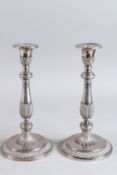 A GOOD PAIR OF ASPREY & CO. SILVER CAST CANDLESTICKS. London 1985, 10ins high, weight: 44ozs.