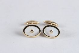 A PAIR OF 9CT YELLOW GOLD, DIAMOND AND MOTHER OF PEARL CUFFLINKS.