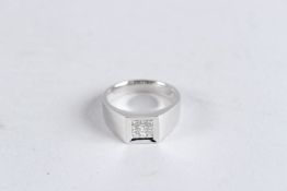 AN 18CT WHITE GOLD AND DIAMOND TABLET SET RING.
