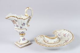 A SAMSON OF PARIS PORCELAIN ARMORIAL SHELL SHAPED EWER AND BASIN, painted with crests and floral