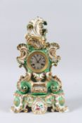 A 19TH CENTURY JACOB PETIT PORCELAIN MANTEL CLOCK AND STAND, green ground with gilt decoration and