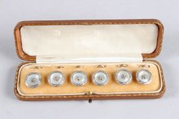 A SET OF SIX 15CT YELLOW GOLD DIAMOND AND MOTHER OF PEARL DRESS STUDS.