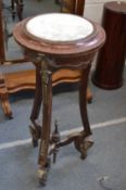 A FRENCH STYLE ORMOLU MOUNTED AND MARBLE INSE JARDINERE STAND with curving legs.