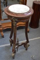 A FRENCH STYLE ORMOLU MOUNTED AND MARBLE INSE JARDINERE STAND with curving legs.