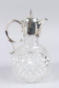 A LATE VICTORIAN SILVER MOUNTED HOBNAIL CUT CLARET JUG, with double 'C' scroll handle, Sheffield