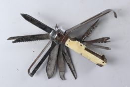 A LARGE EARLY, POSSIBLY GERMAN, COMBINATION KNIFE Stamped K. G. NAZ. HARZ., with scissors, file,