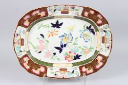 AN ASHWORTH IRONSTONE SERVING DISH, decorated in the Japanese taste, 20.5in wide.