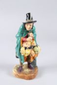 A ROYAL DOULTON FIGURE 