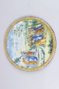 AN URBINO MAJOLICA CIRCULAR POTTERY PLAQUE, 'Moses and the stone tablets of the Ten Commandments',