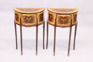 A PAIR OF FRENCH STYLE MARQUERTY AND ORMOLU THREE DRAWER DEMI LUNE BEDSIDE TABLES. 2ft 3ins high.
