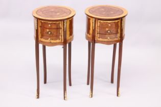 A PAIR OF FRENCH STYLE MARQUERTY AND ORMOLU THREE DRAWER CIRCULAR BEDSIDE TABLES. 2ft 3ins high.