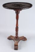 A RARE 19TH CENTURY YEW WOOD CIRCULAR TOP TABLE, the top carved with roses, turned column with '