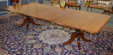 A VERY GOOD 19TH CENTURY TWIN PILLAR DINING TABLE, each rectangular pedestal section having a single