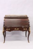 A LARGE FRENCH STYLE MAHOGANY AND ORMOLU TAMBOUR ROLL-TOP DESK, with three drawers on curving