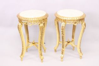 A PAIR OF FRENCH STYLE GILTWOOD AND MARBLE TOP CIRCULAR OCCASIONAL TABLES, 2ft 4in high x 1ft 6in
