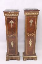 A PAIR OF FRENCH STYLE FAUX ROSEWOOD AND BURR WOOD, ORMOLU AND MARBLE TOP PEDESTAL COLUMNS, 4ft