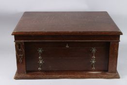 A GOOD OAK CUTLERY CANTEEN/BOX, with a hinged top above two long drawers with locking bar, 2ft 1.5in