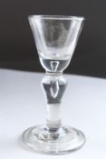 A GEORGIAN BALUSTER TEARDROP WINE GLASS. 5ins high.